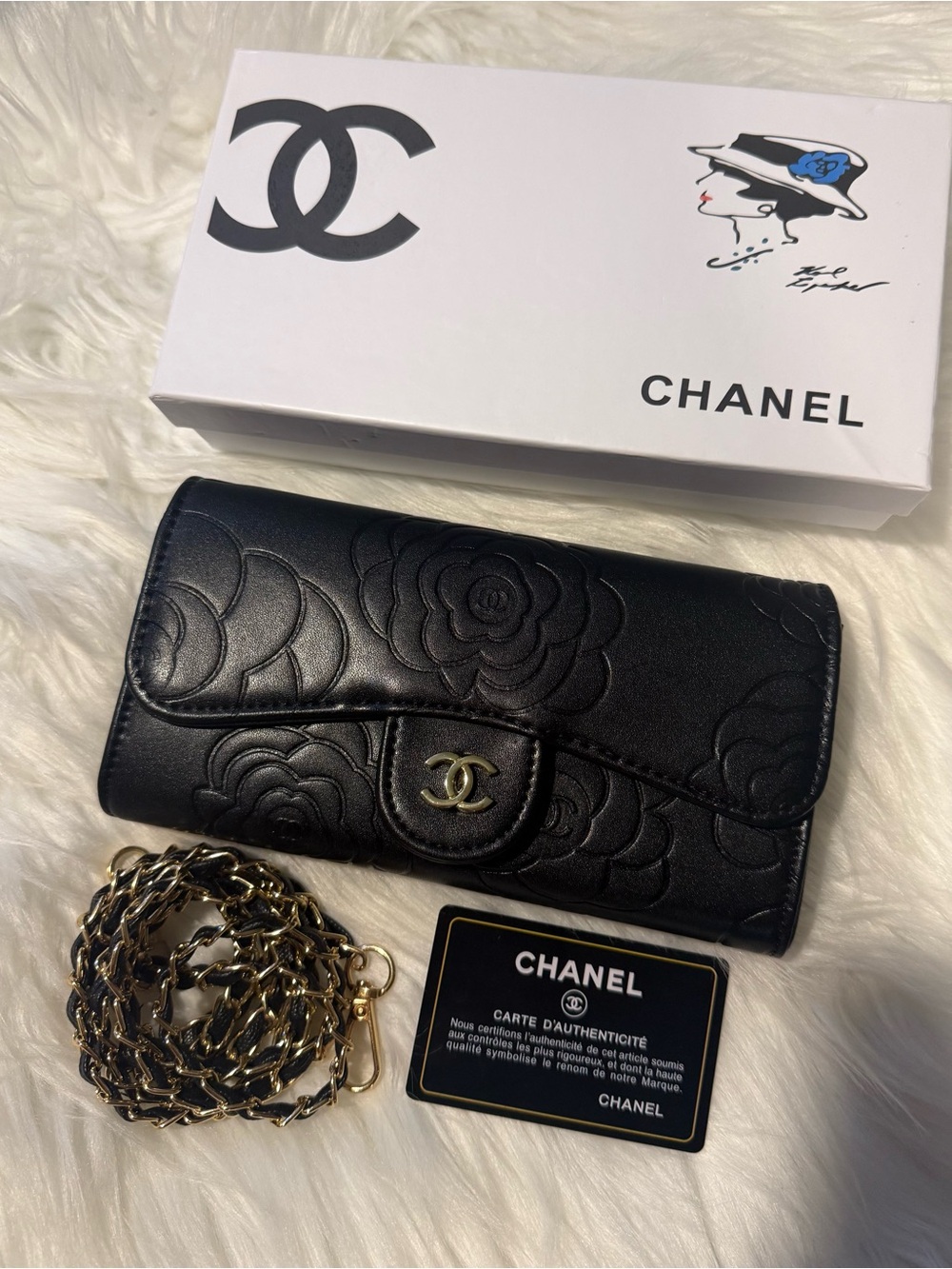 CHANEL Black Camellia-Embossed Wallet with Gold Chain